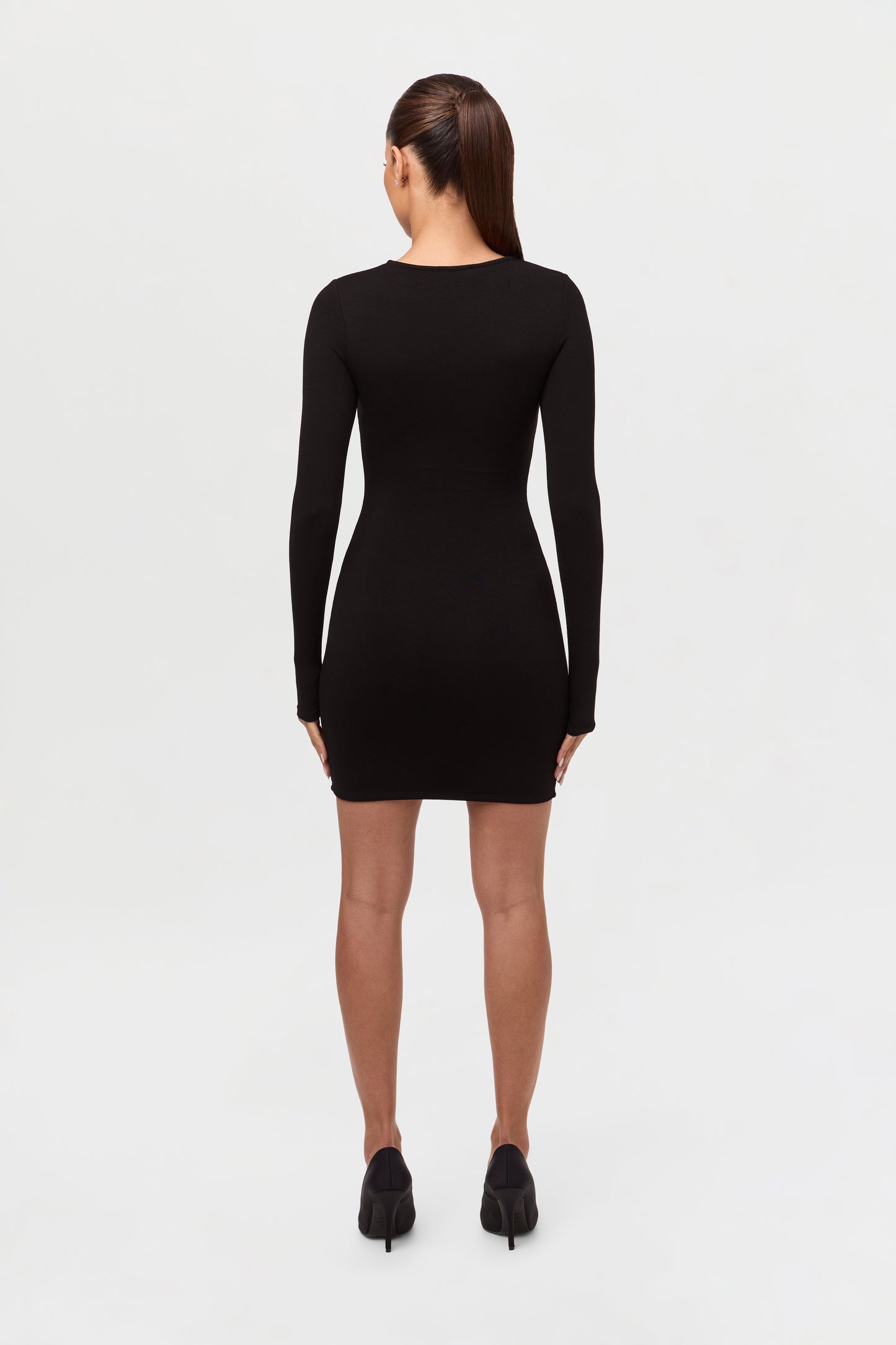 Got U In A Bind Mini Dress