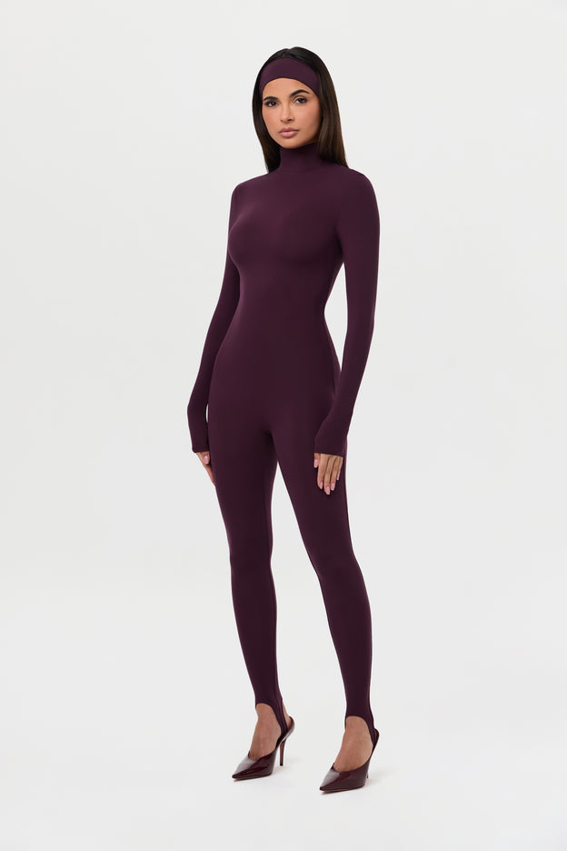 Naked Turtleneck Jumpsuit with Stirrup