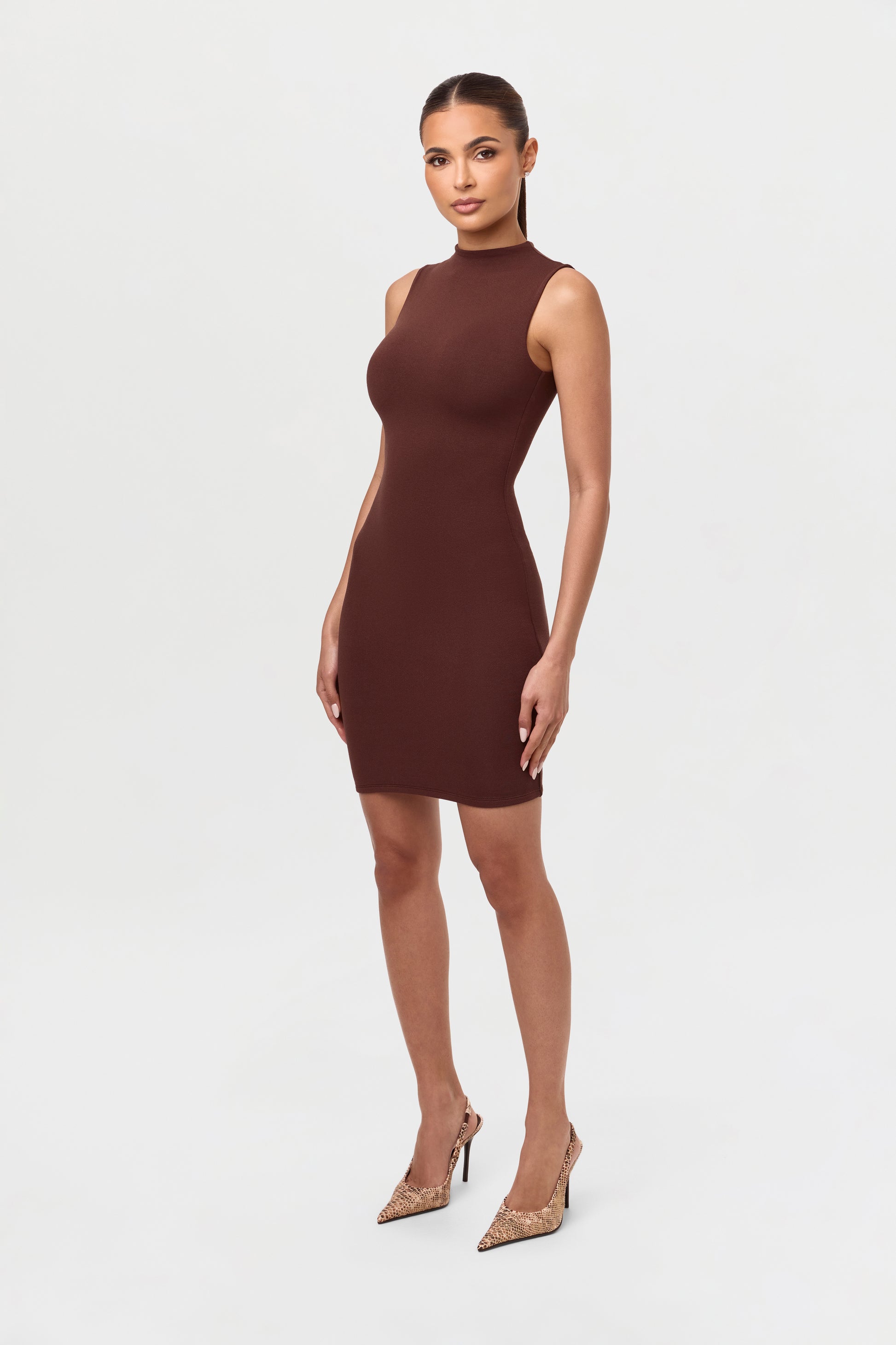 dressed naked women Woman Wearing Alluring Dress in Studio Stock Photo Naked girl getting dressed while