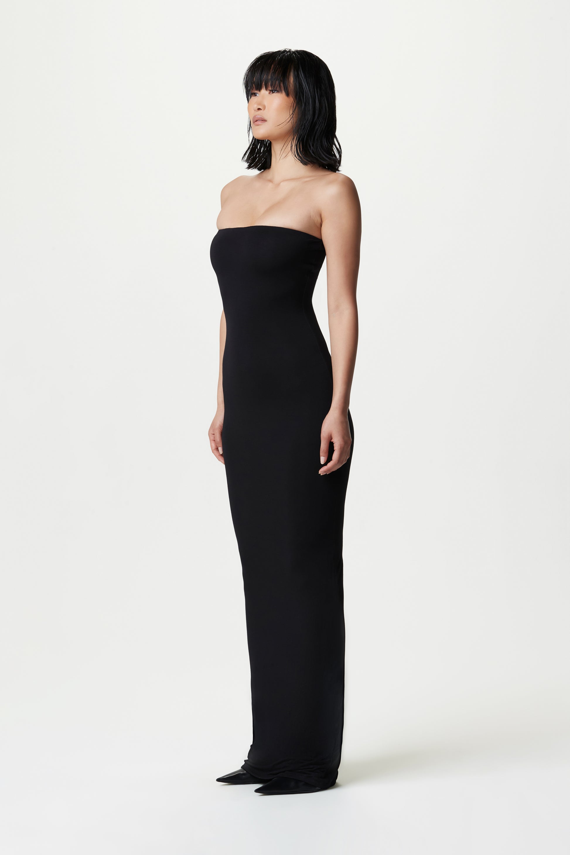 side-view of black strapless maxi dress