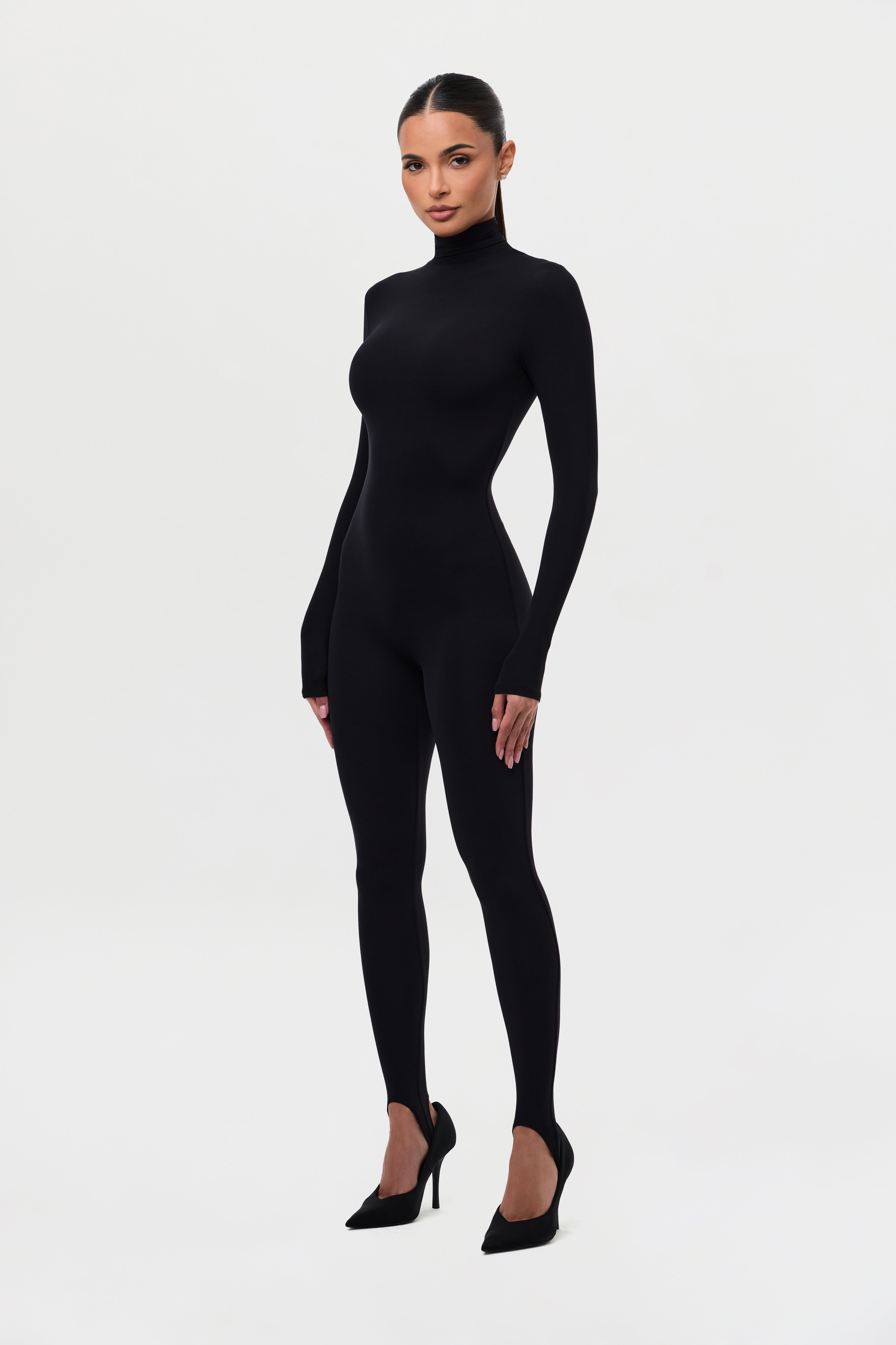 Naked Turtleneck Stirrup Jumpsuit