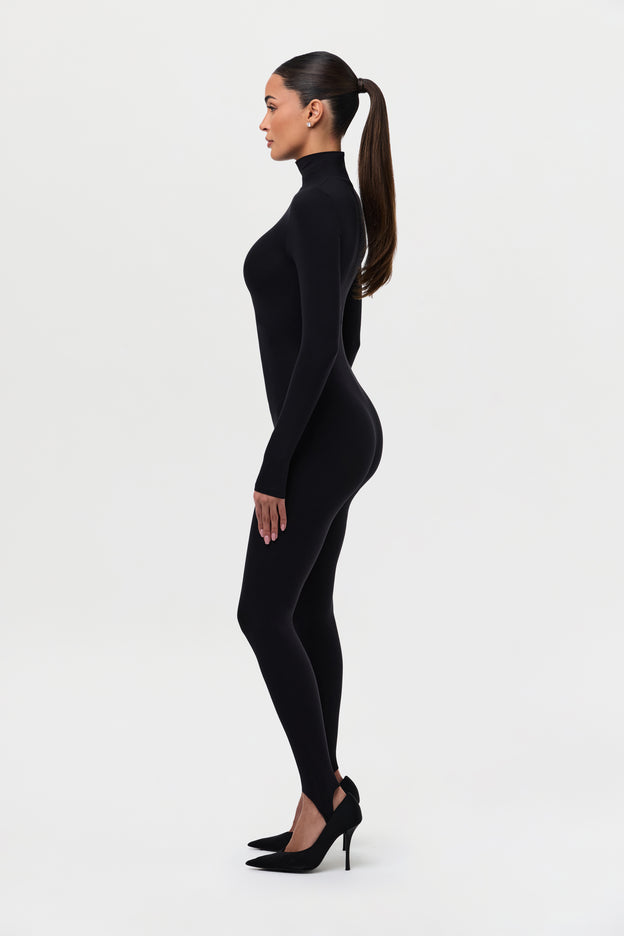 Naked Turtleneck Stirrup Jumpsuit