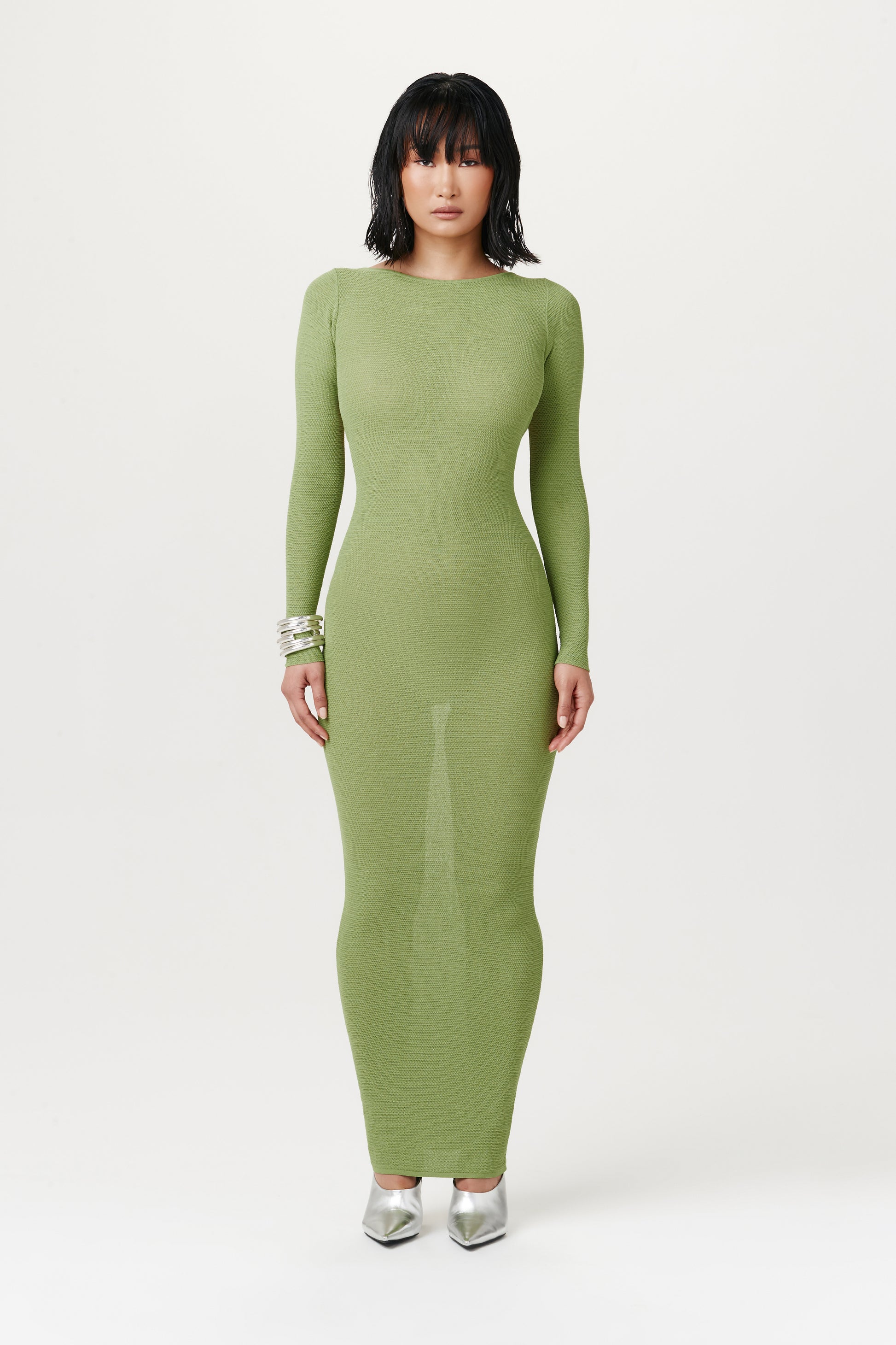 full body view of semi-see-through long-sleeve maxi dress in light green