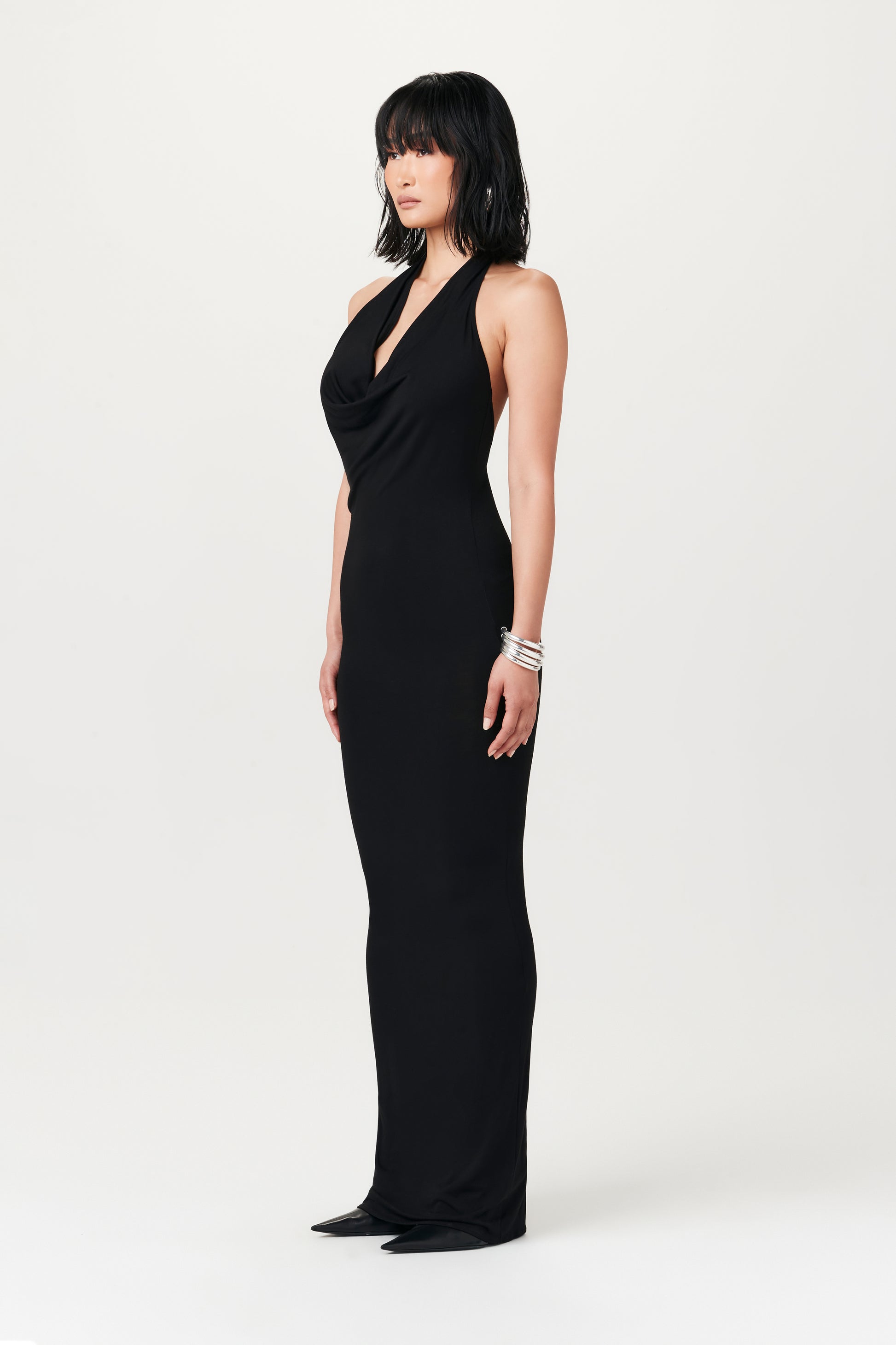 side-view of black cowl-neck maxi dress