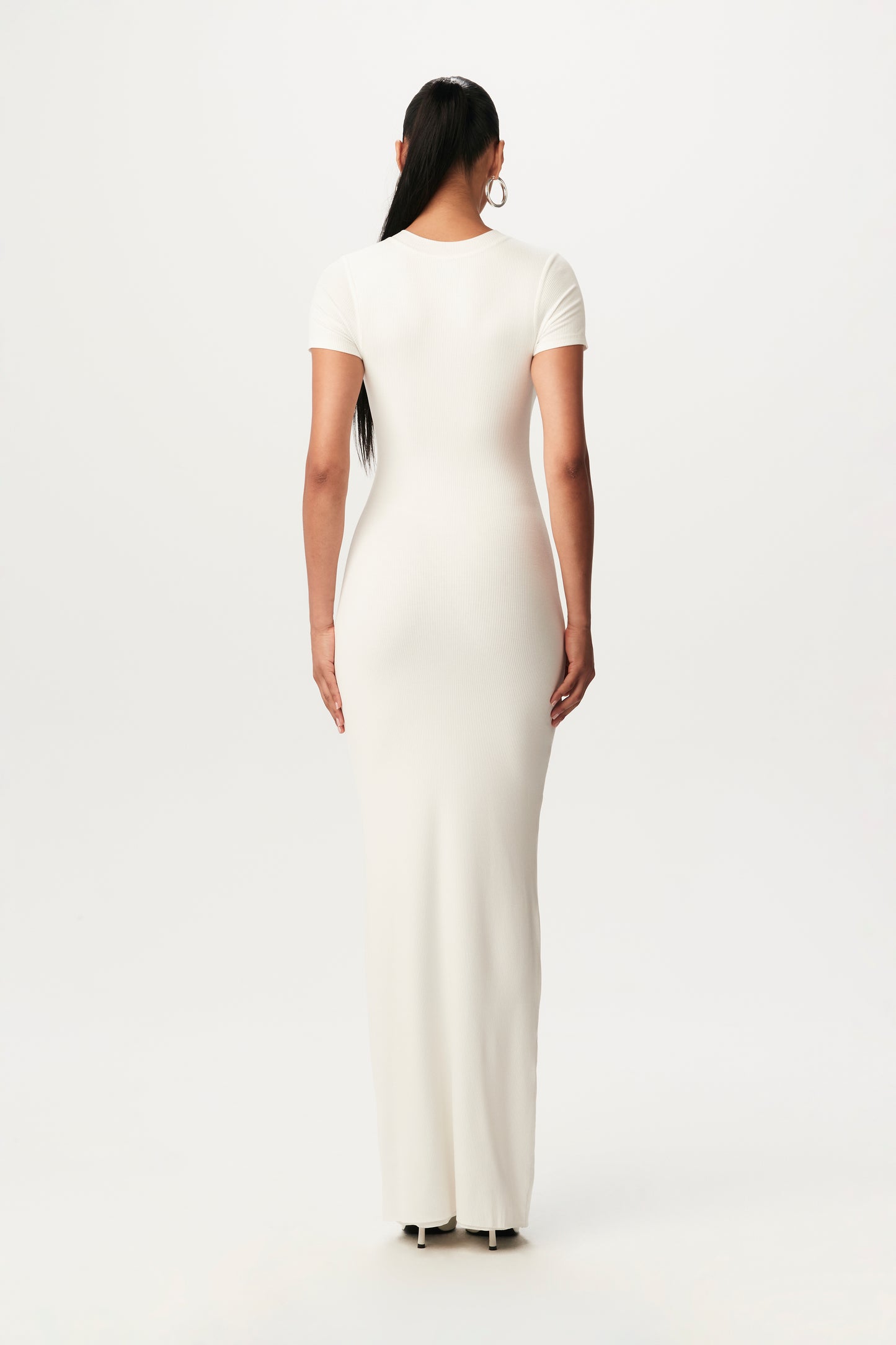 rear view of white bodycon maxidress with short-sleeves