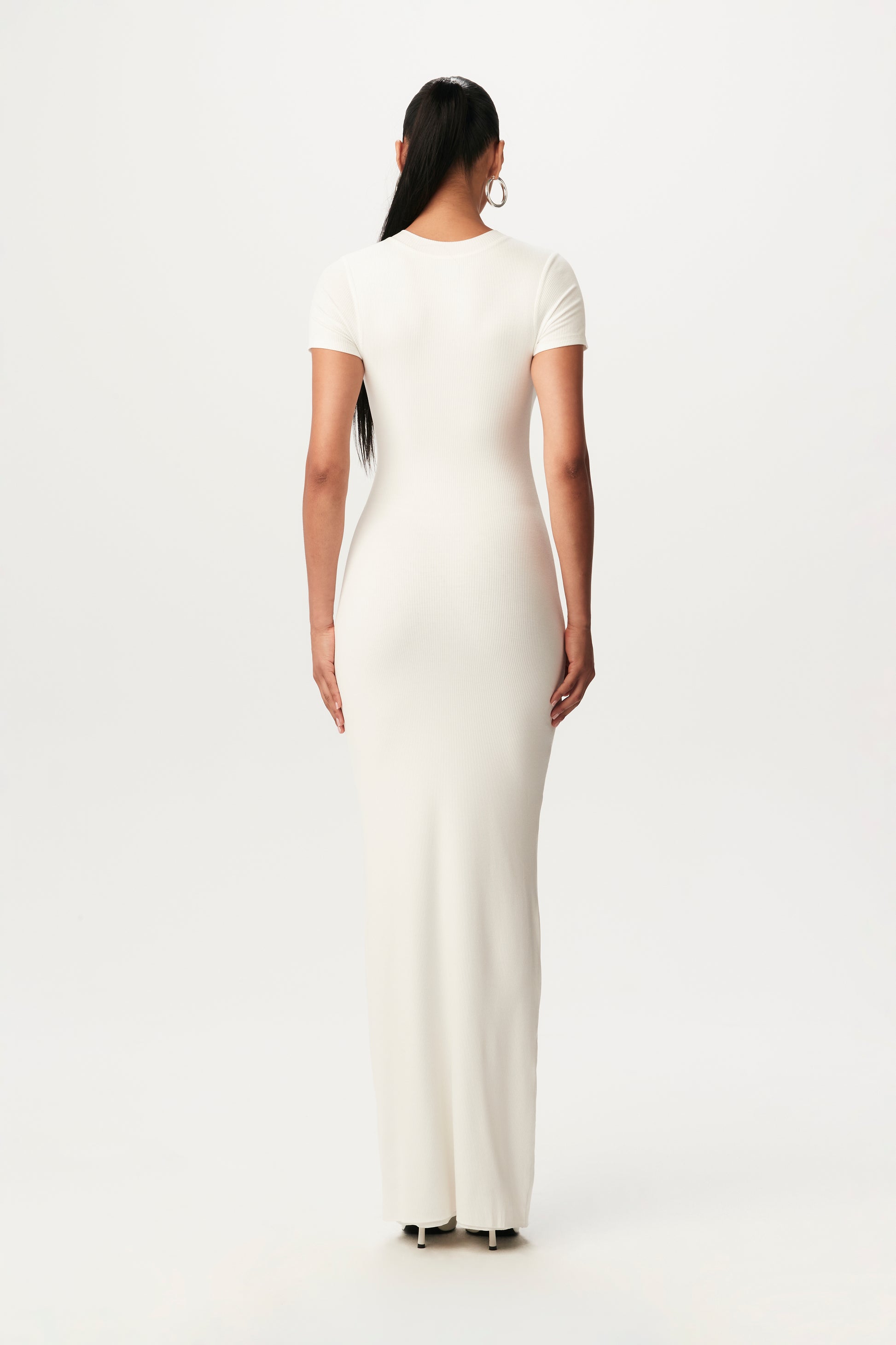 rear view of white bodycon maxidress with short-sleeves