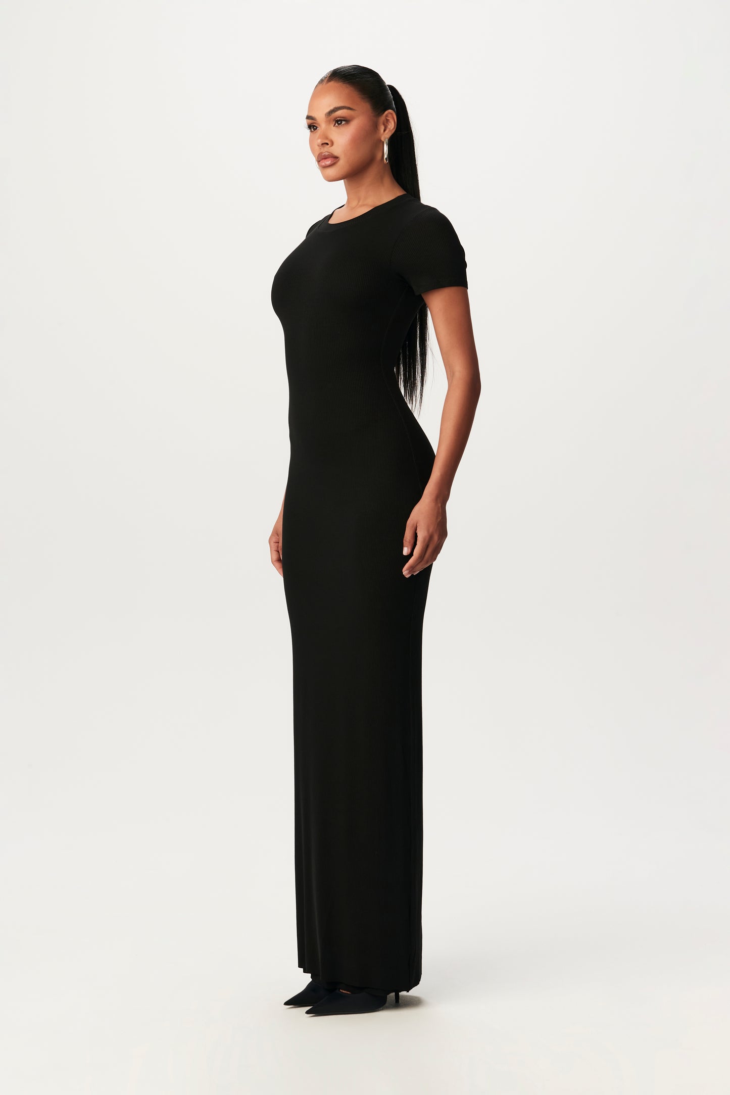 side-view of black, short-sleeve bodycon maxi dress