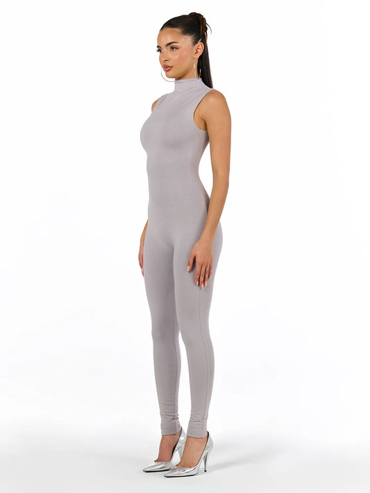 Naked Wardrobe on Instagram: “The NW Deep-V Jumpsuit enhances